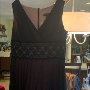 Cute little black dress with nude lining in size 16.